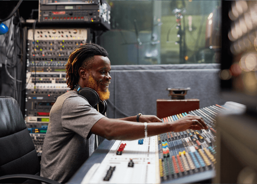 Man working in studio with a sound board